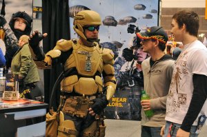 Sgt. 1st Class Matthew Oliver suits up in a futuristic combat uniform with a Tactical Assault Light Operator Suit-like look at the 2012 Chicago Auto Show.  (U.S. Army photo)