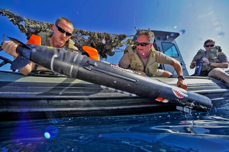 U.S. Navy sailors deploy a MK 18 MOD 2 Swordfish unmanned undersea vehicle (UUV) to survey the ocean floor during the International Mine Countermeasure Exercise . (U.S. Navy photo by Mass Communication Specialist 1st Class Blake Midnight/Released)