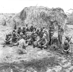 The First Special Service Force troops, nicknamed "Black Devils"  by the Nazis, being briefed before a night patrol at Anzio, Italy, in 1944 